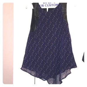 Flowy geometric top with faux leather detail